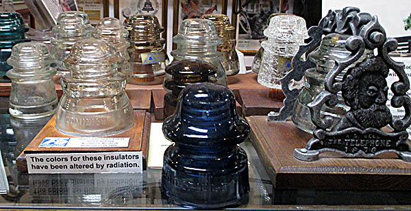 Montrose Historical & Telephone Pioneer Museum These fake telephone pole insulators were subjected to radiation to change their color.